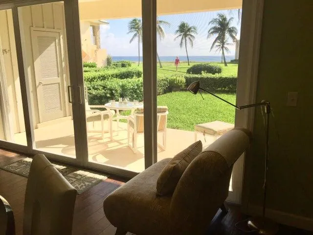 a living room with large windows