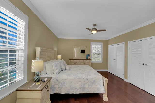 a bathroom with a shower sink vanity and mirror