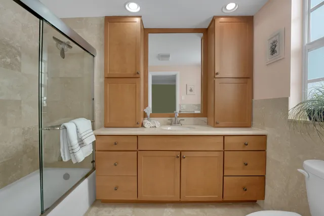 a bedroom with two beds and painted walls