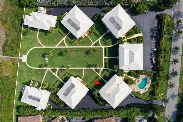 a patio with a yard table and chairs