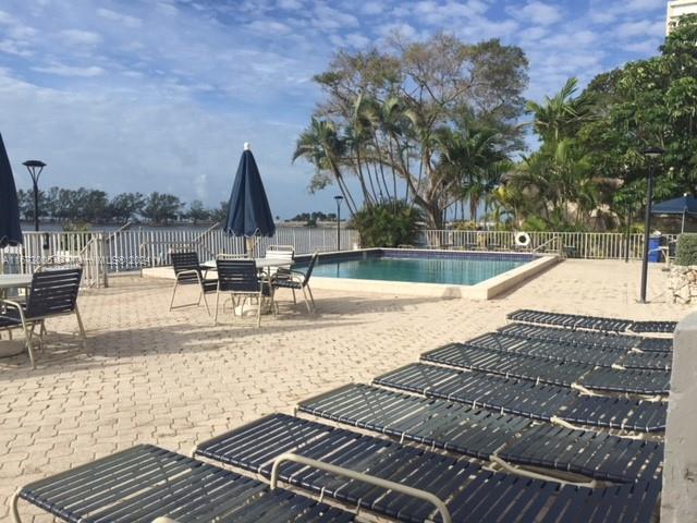 Brickell Miami, FL 33129 - Photo 6 of 24 a view of a swimming pool with a patio