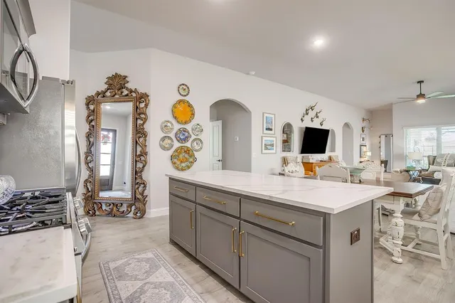 a view of living room with furniture and flat screen tv