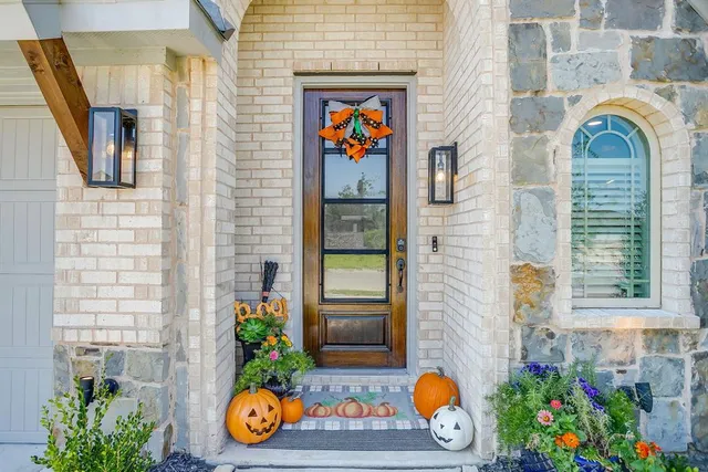 a front view of a house with chairs