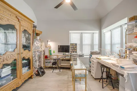 a view of a livingroom with furniture and a fireplace