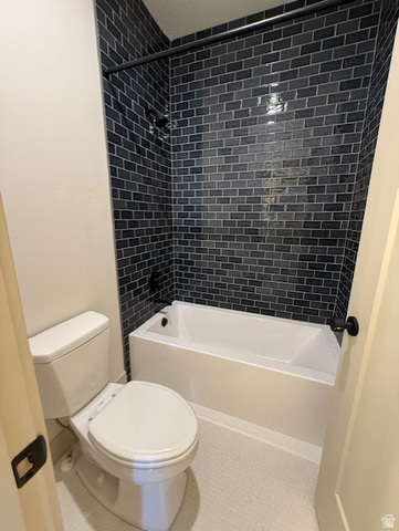 533 West S Temple Street, Unit 309 Tooele, UT 84074 - Photo 16 of 24 Bathroom featuring toilet and shower / bathtub combination