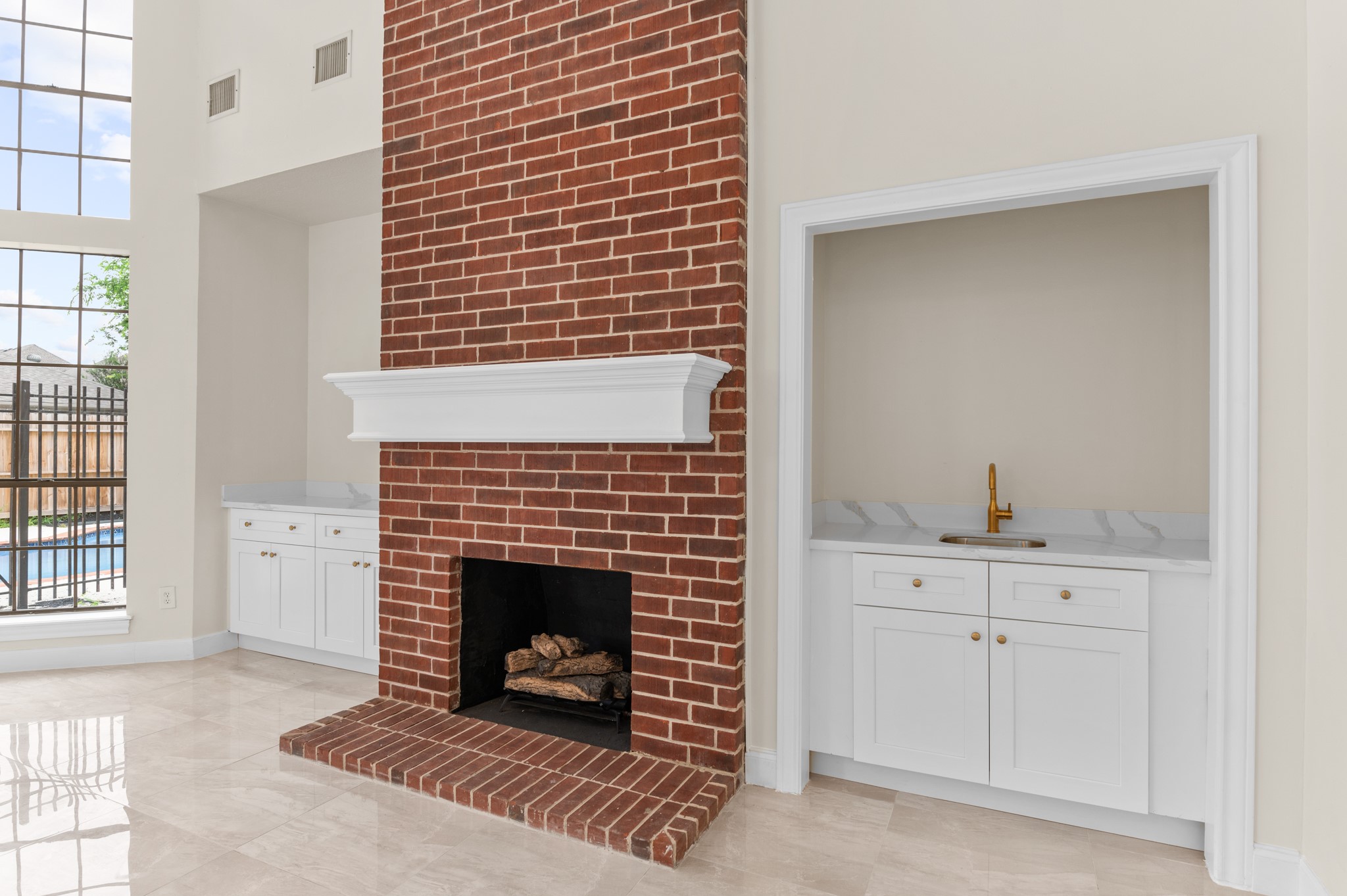 17402 Wilton Park Court Spring, TX 77379 - Photo 9 of 50 a living room with a fireplace