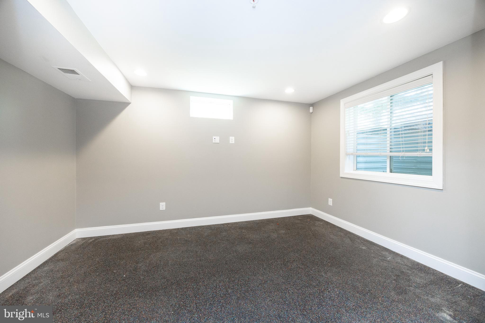 206 Quarry Point Road Malvern, PA 19355 - Photo 33 of 43 an empty room with windows