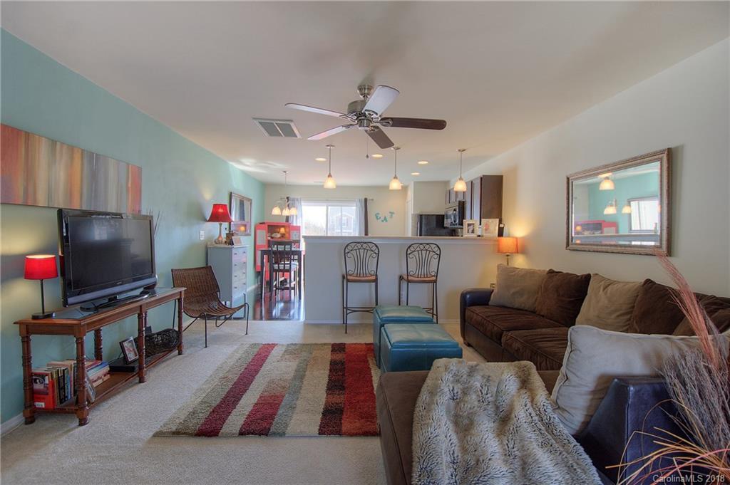 311 River Clay Road Fort Mill, SC 29708 - Photo 13 of 26 a living room with furniture and a flat screen tv