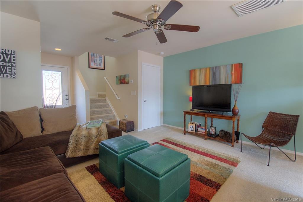 311 River Clay Road Fort Mill, SC 29708 - Photo 14 of 26 a living room with furniture and a flat screen tv