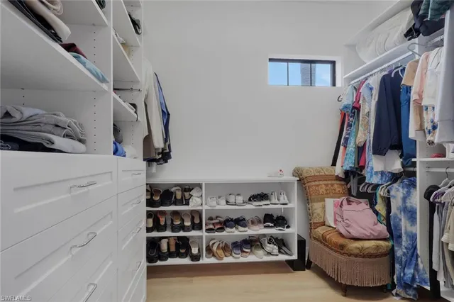a bathroom with a bathtub sink and mirror
