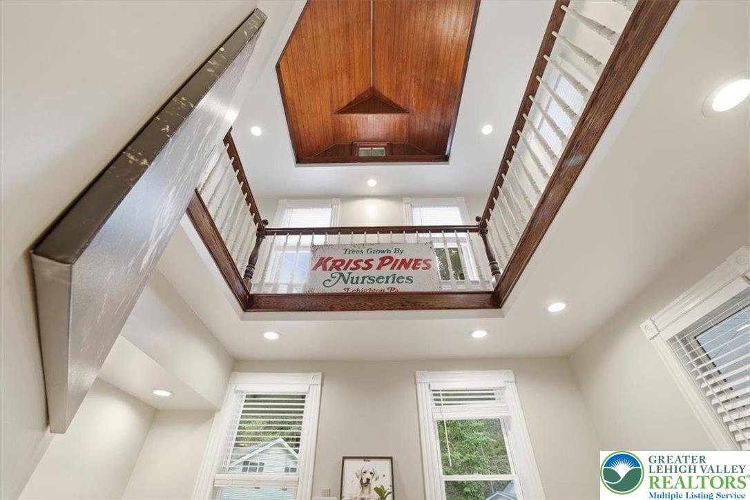 3585 Fairyland Road Lehighton, PA 18235 - Photo 32 of 57 A spacious foyer offers a grand entrance with a vaulted wood ceiling and a captivating balcony overlook.