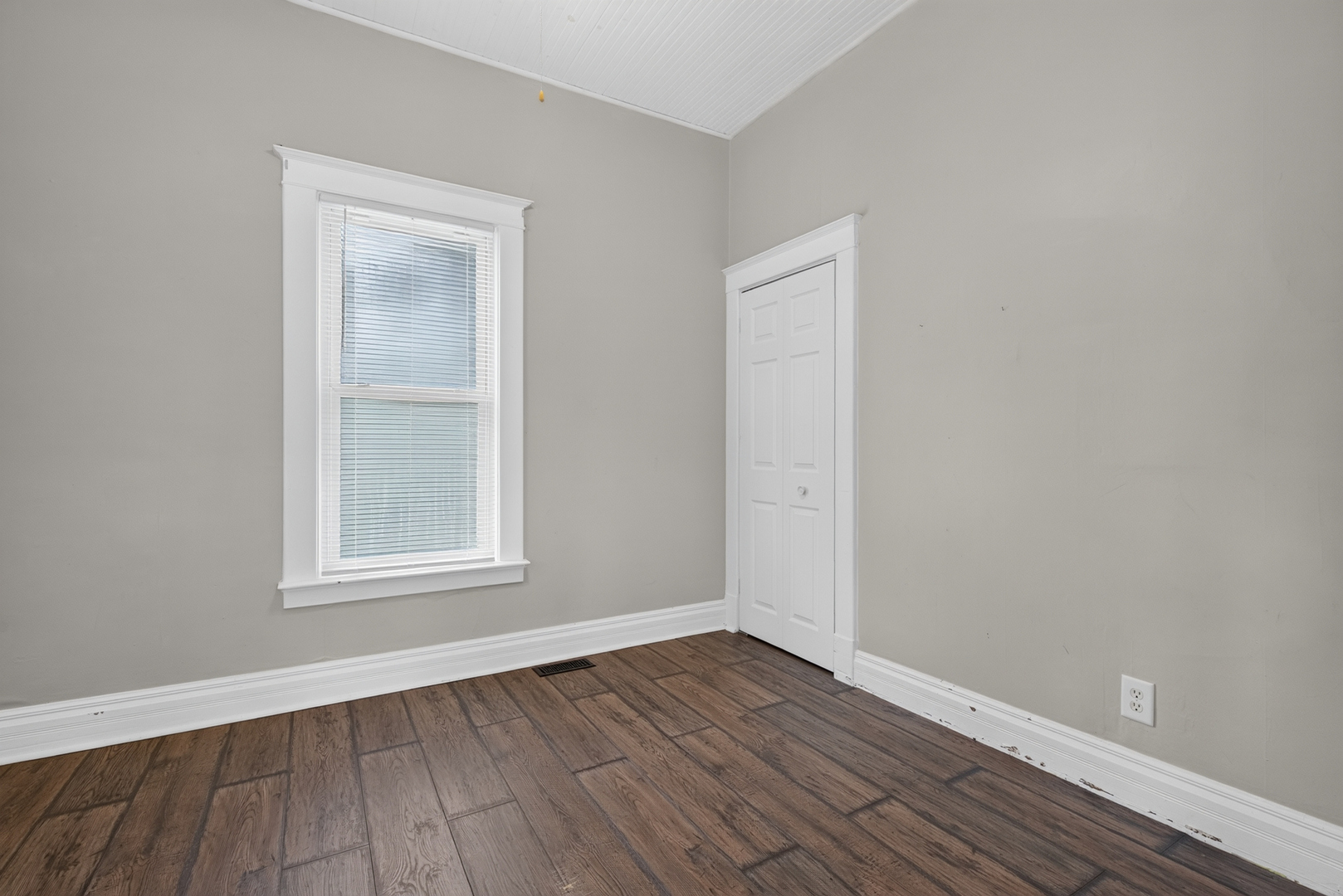 1128 Butler Street Morris, IL 60450 - Photo 22 of 28 an empty room with wooden floor and windows