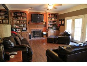 3404 Redstone Road Johnson City, TN 37604 - Photo 9 of 21 fireplace and bookshelves