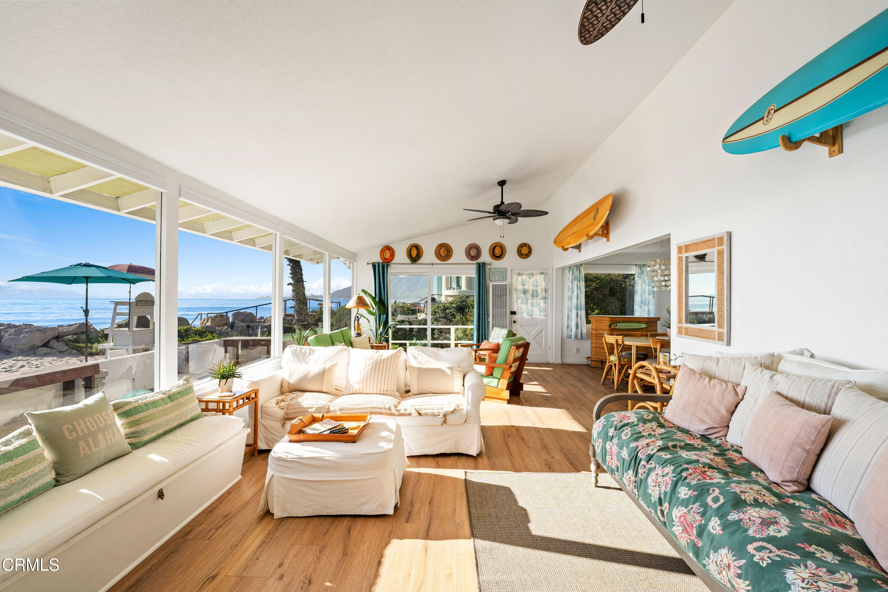 3048 Solimar Beach Drive Ventura, CA 93001 - Photo 17 of 35 a living room with furniture and a large window