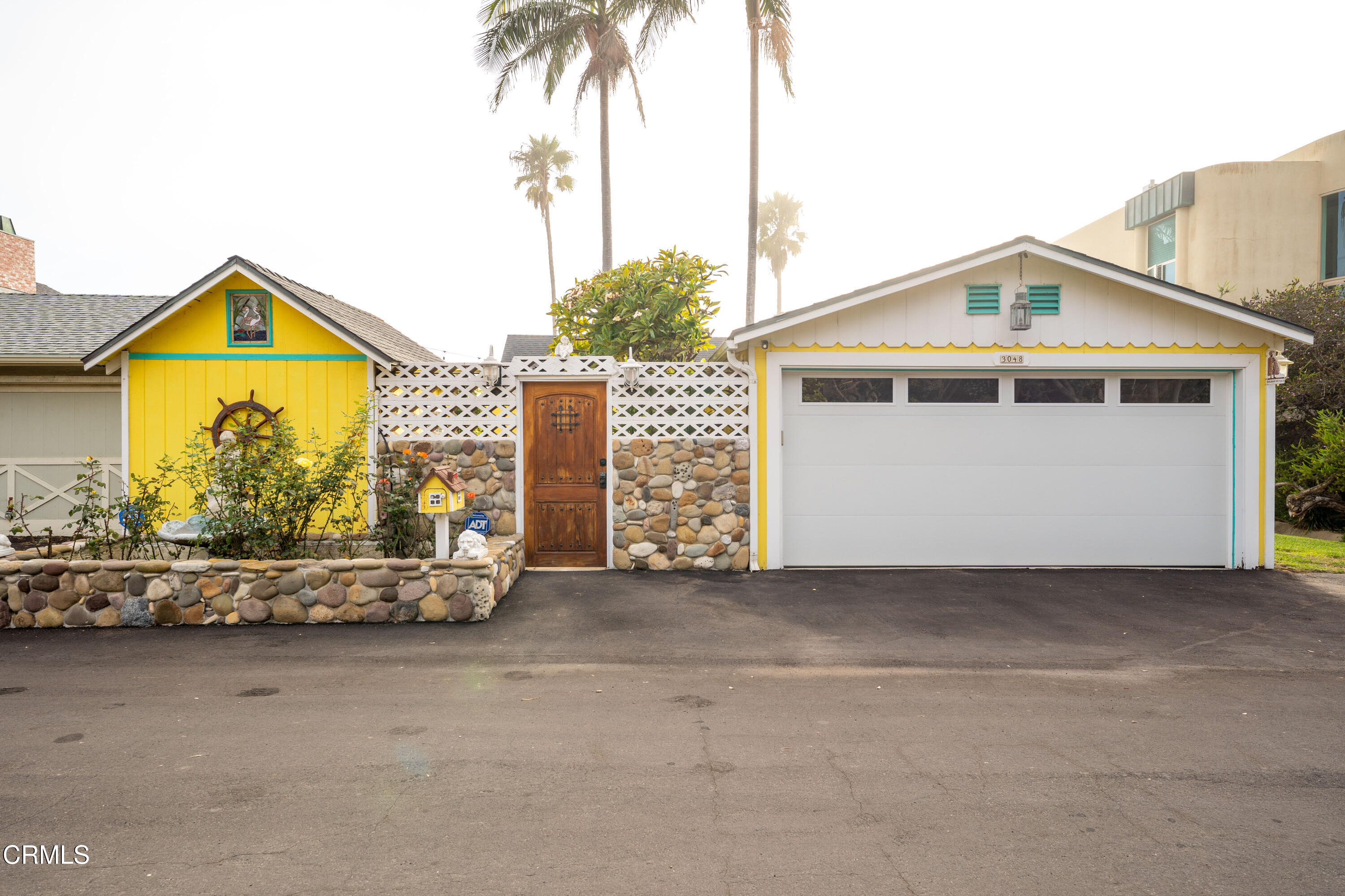3048 Solimar Beach Drive Ventura, CA 93001 - Photo 2 of 35 a view of front of house with a yard