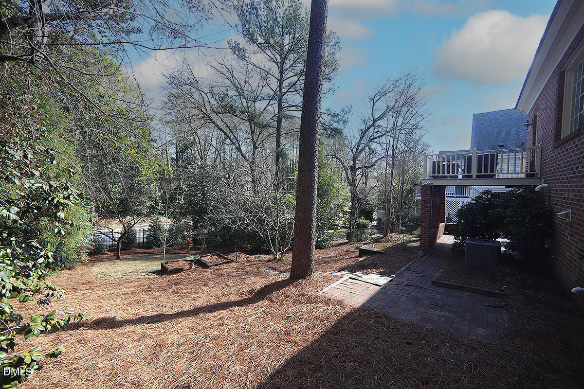 815 Marlowe Road, Unit 10 Raleigh, NC 27609 - Photo 22 of 28 a view of a park with bench and trees
