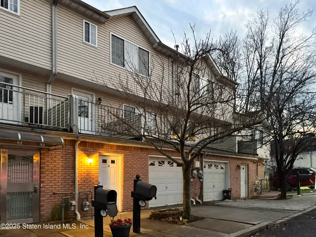 a view of a building with a tree