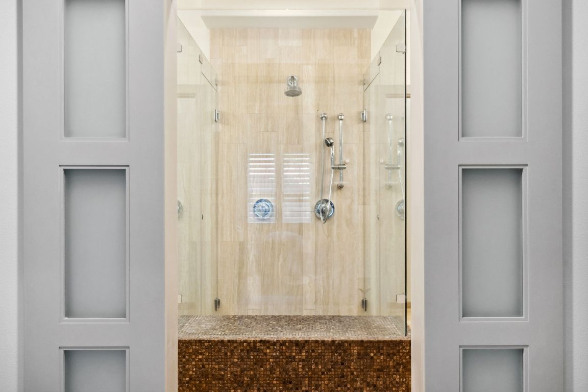 9 Swiftwater Trail The Hills, TX 78738 - Photo 22 of 34 Bathroom view of a stall shower