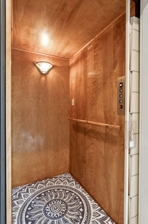 9 Swiftwater Trail The Hills, TX 78738 - Photo 30 of 34 Bathroom with elevator and wood ceiling