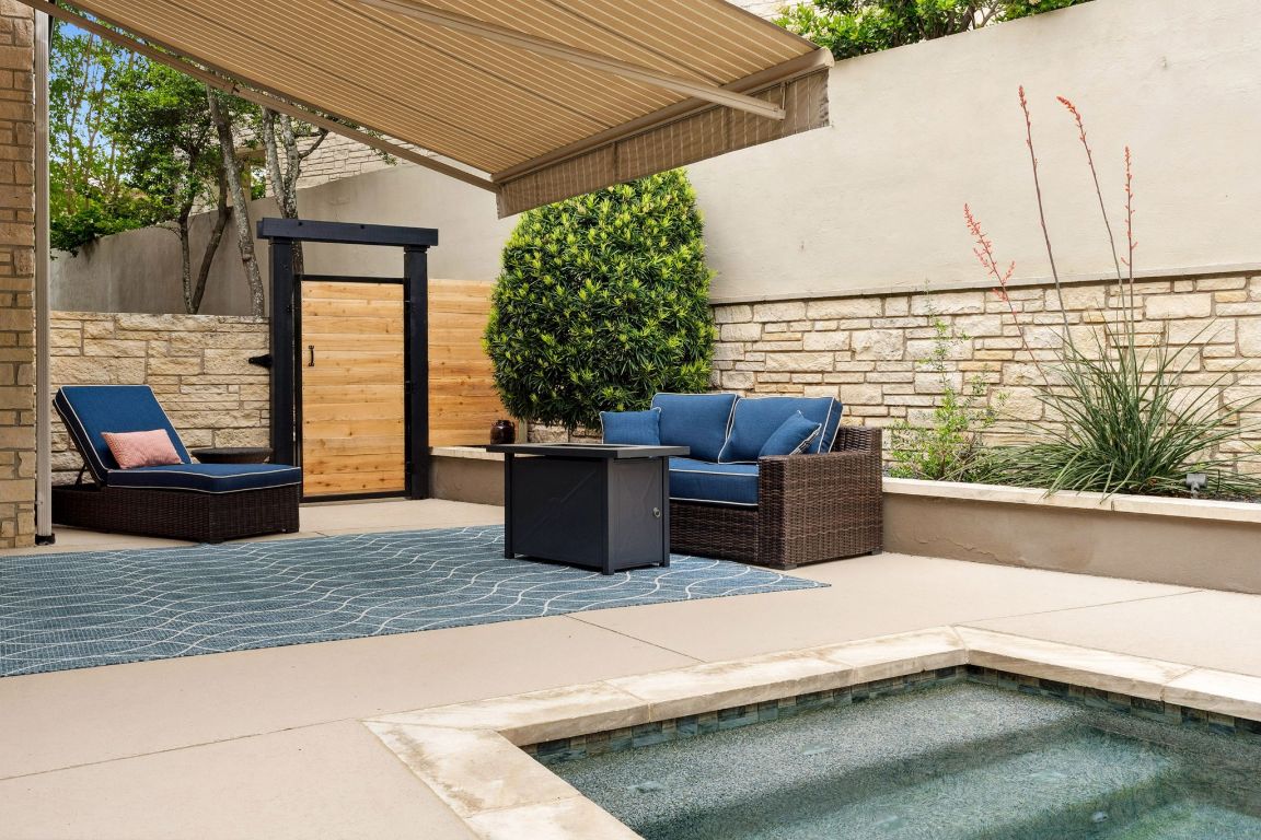 9 Swiftwater Trail The Hills, TX 78738 - Photo 32 of 34 View of pool featuring a patio and an outdoor hangout area