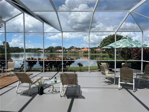 a living room with patio furniture