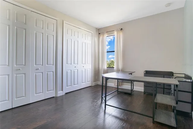 a view of a livingroom with furniture