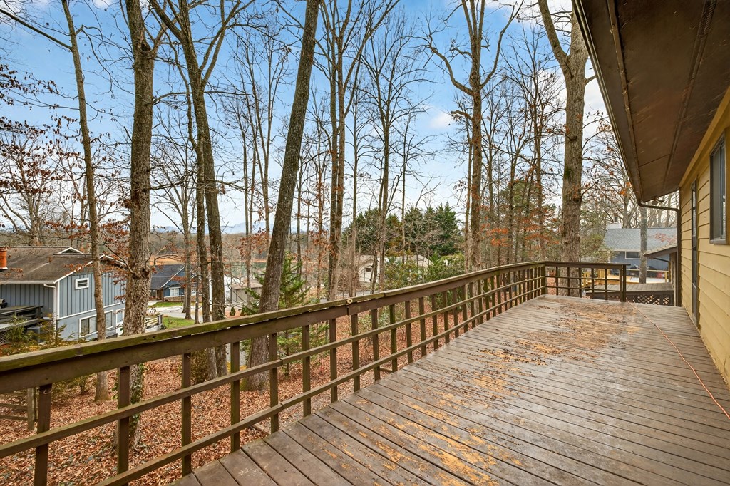 951 McClure Road Hayesville, NC 28904 - Photo 19 of 45 a view of balcony with wooden floor and fence