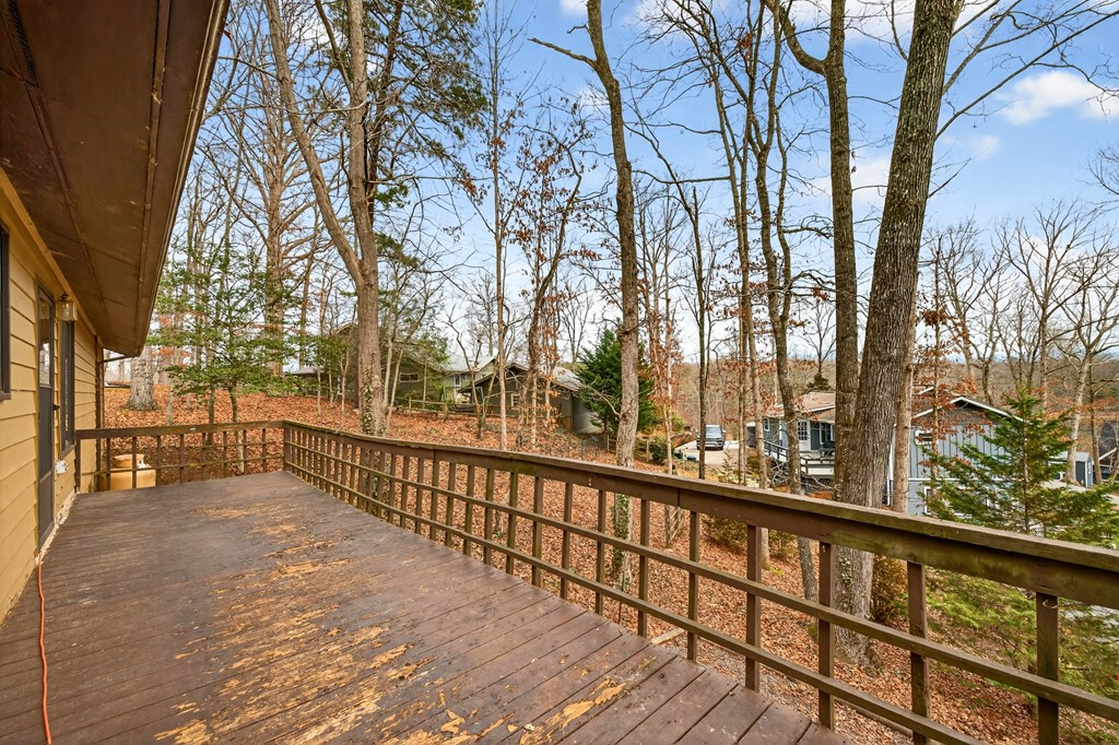 951 McClure Road Hayesville, NC 28904 - Photo 20 of 45 a view of a balcony with trees