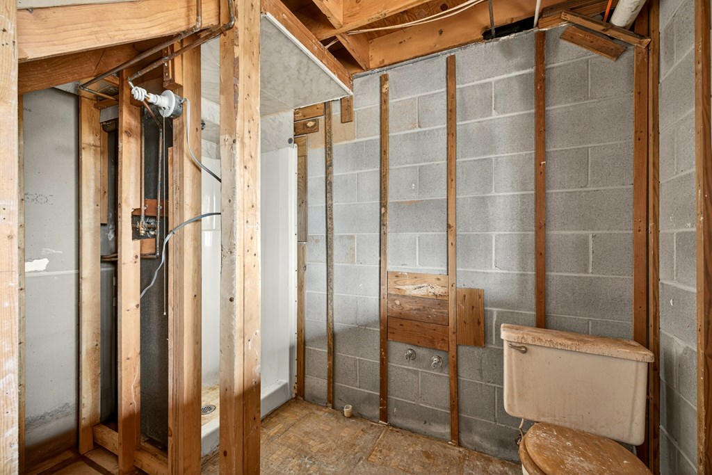 951 McClure Road Hayesville, NC 28904 - Photo 23 of 45 a bathroom with a toilet and a shower