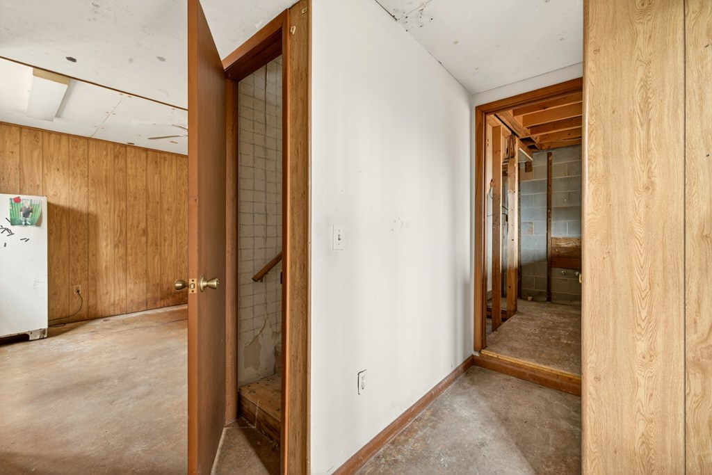 951 McClure Road Hayesville, NC 28904 - Photo 27 of 45 a view of a hallway with wooden shelves