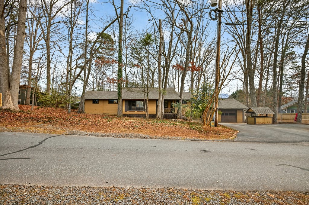 951 McClure Road Hayesville, NC 28904 - Photo 3 of 45 front view of a house with a trees