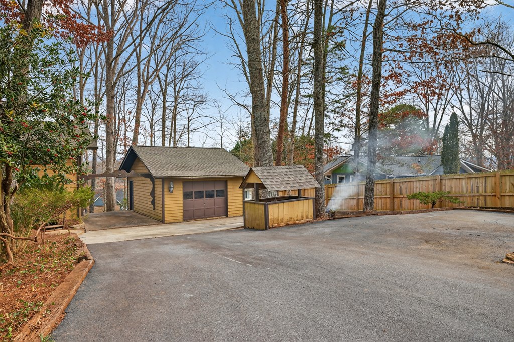951 McClure Road Hayesville, NC 28904 - Photo 38 of 45 a house with trees in front of it