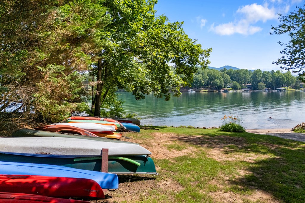 951 McClure Road Hayesville, NC 28904 - Photo 45 of 45 a blue swimming pool with lake view