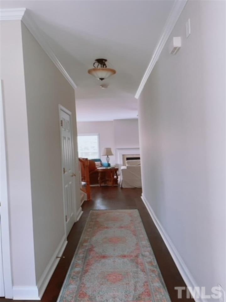 407 Challenge Road Raleigh, NC 27603 - Photo 12 of 29 a view of a room with a baby crib furniture and a window