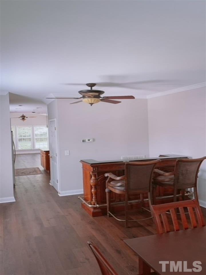 407 Challenge Road Raleigh, NC 27603 - Photo 14 of 29 a view of workspace with wooden floor