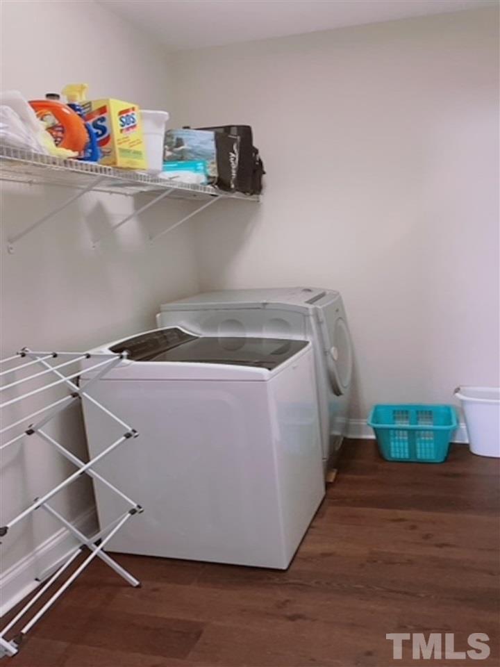 407 Challenge Road Raleigh, NC 27603 - Photo 17 of 29 a utility room with washer and dryer