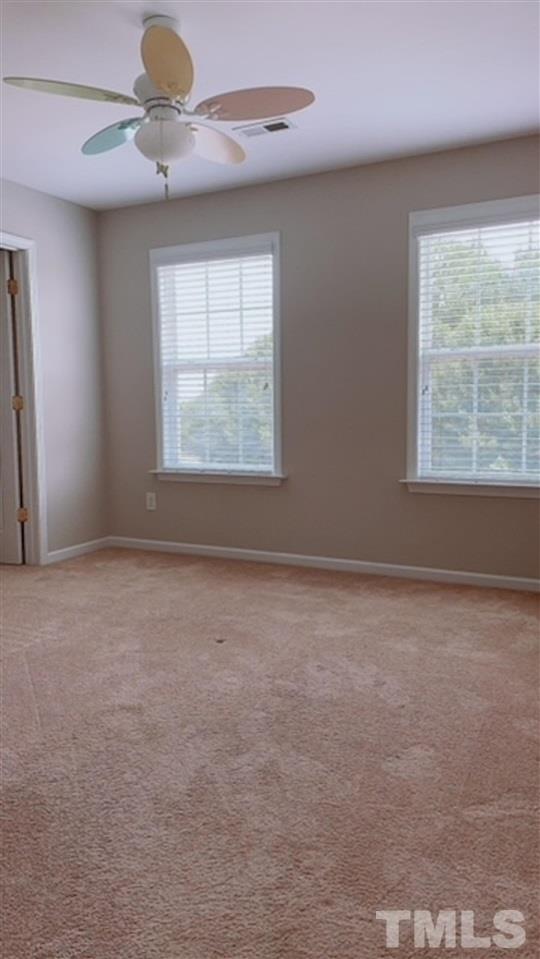 407 Challenge Road Raleigh, NC 27603 - Photo 10 of 29 a view of an empty room with a window