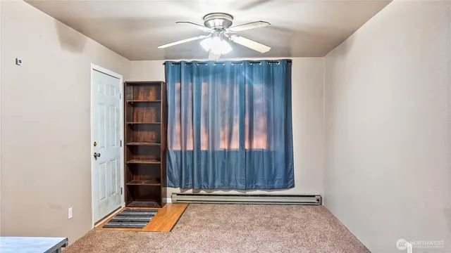 a view of a utility room with closet