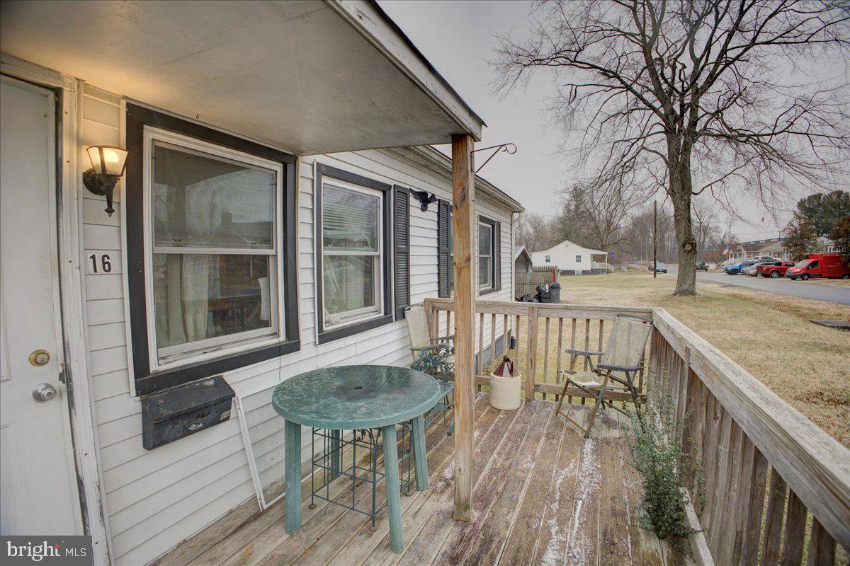 16 Taxi Way Middle River, MD 21220 - Photo 16 of 16 a view of a patio with a table chairs and a table