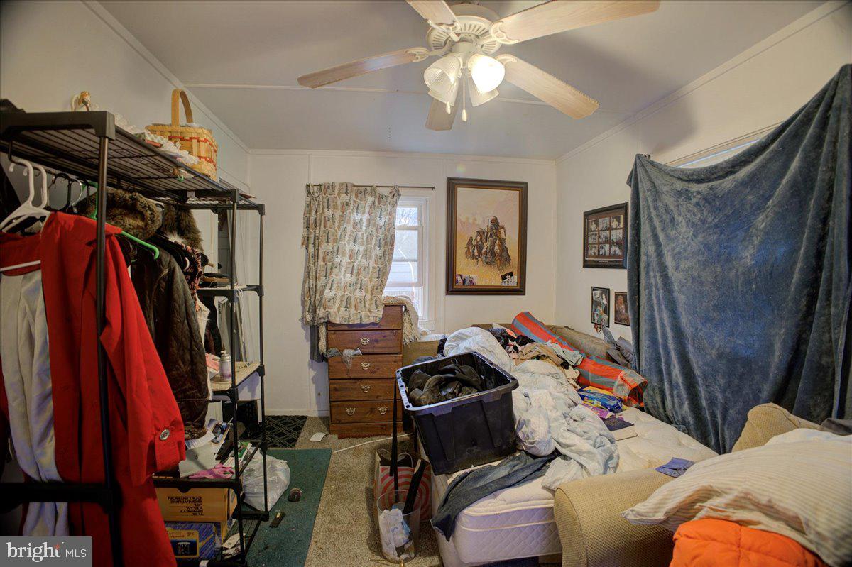 16 Taxi Way Middle River, MD 21220 - Photo 7 of 16 a bedroom with furniture and a window