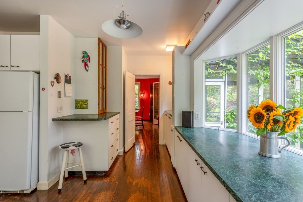 893 Highland Street Hamilton, MA 01982 - Photo 20 of 42 a living room with furniture and wooden floor