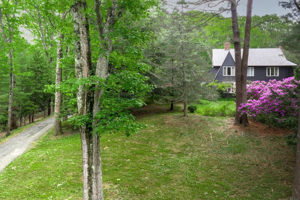 893 Highland Street Hamilton, MA 01982 - Photo 2 of 42 a front view of a house with garden