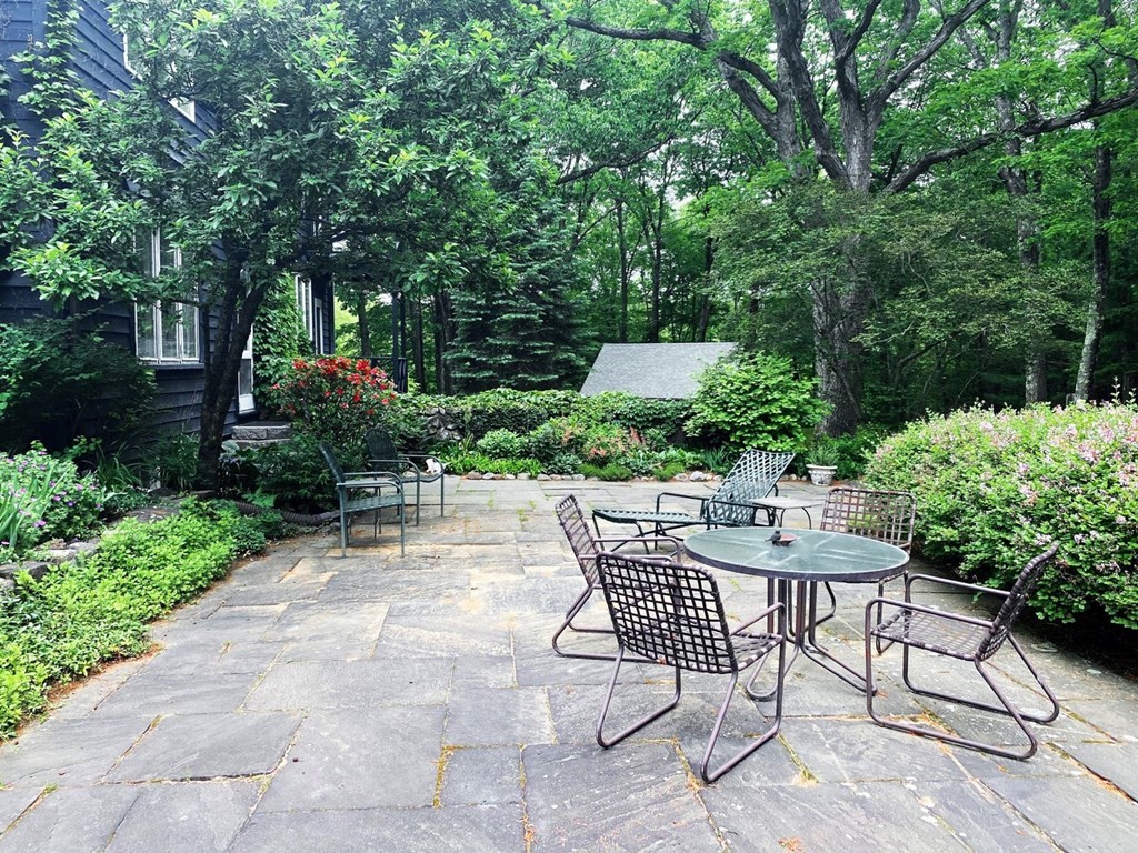 893 Highland Street Hamilton, MA 01982 - Photo 37 of 42 a view of backyard with seating and green space