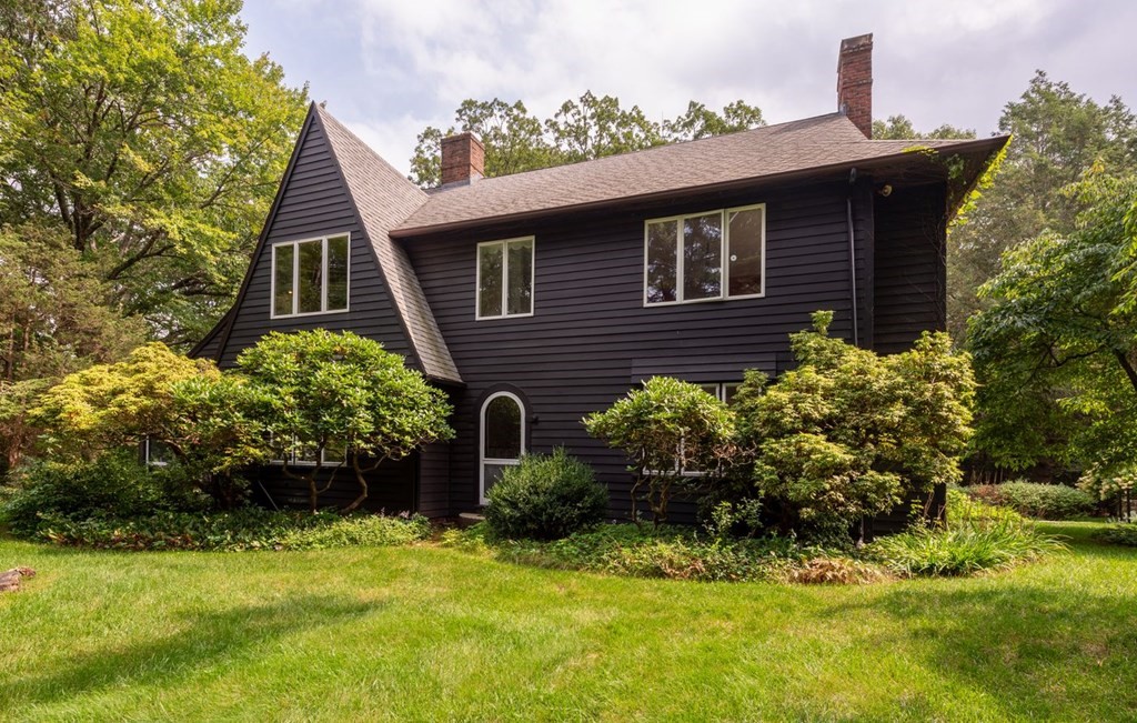 893 Highland Street Hamilton, MA 01982 - Photo 39 of 42 a front view of a house with a yard