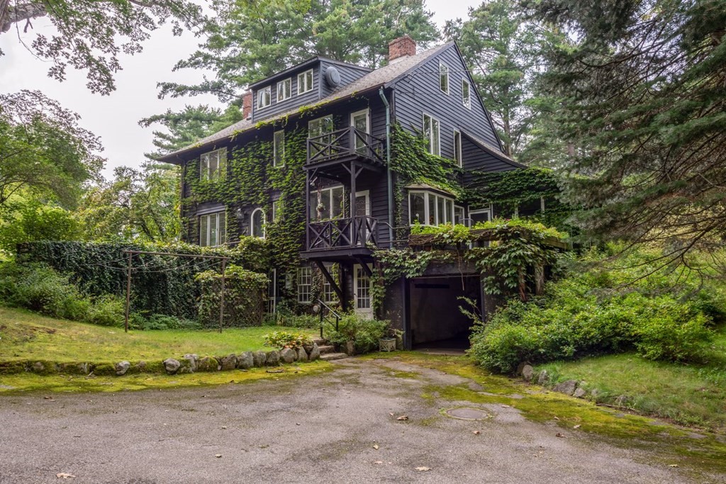 893 Highland Street Hamilton, MA 01982 - Photo 41 of 42 a front view of a house with a garden