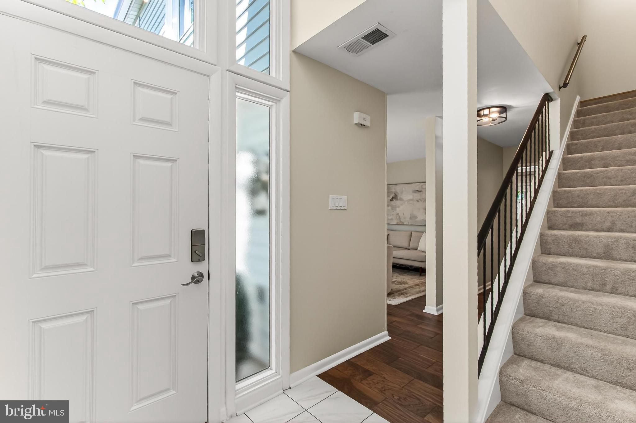 1498 Roundleaf Court Reston, VA 20190 - Photo 2 of 62 Standout Foyer with Amazing Windows & Vaulted Clg