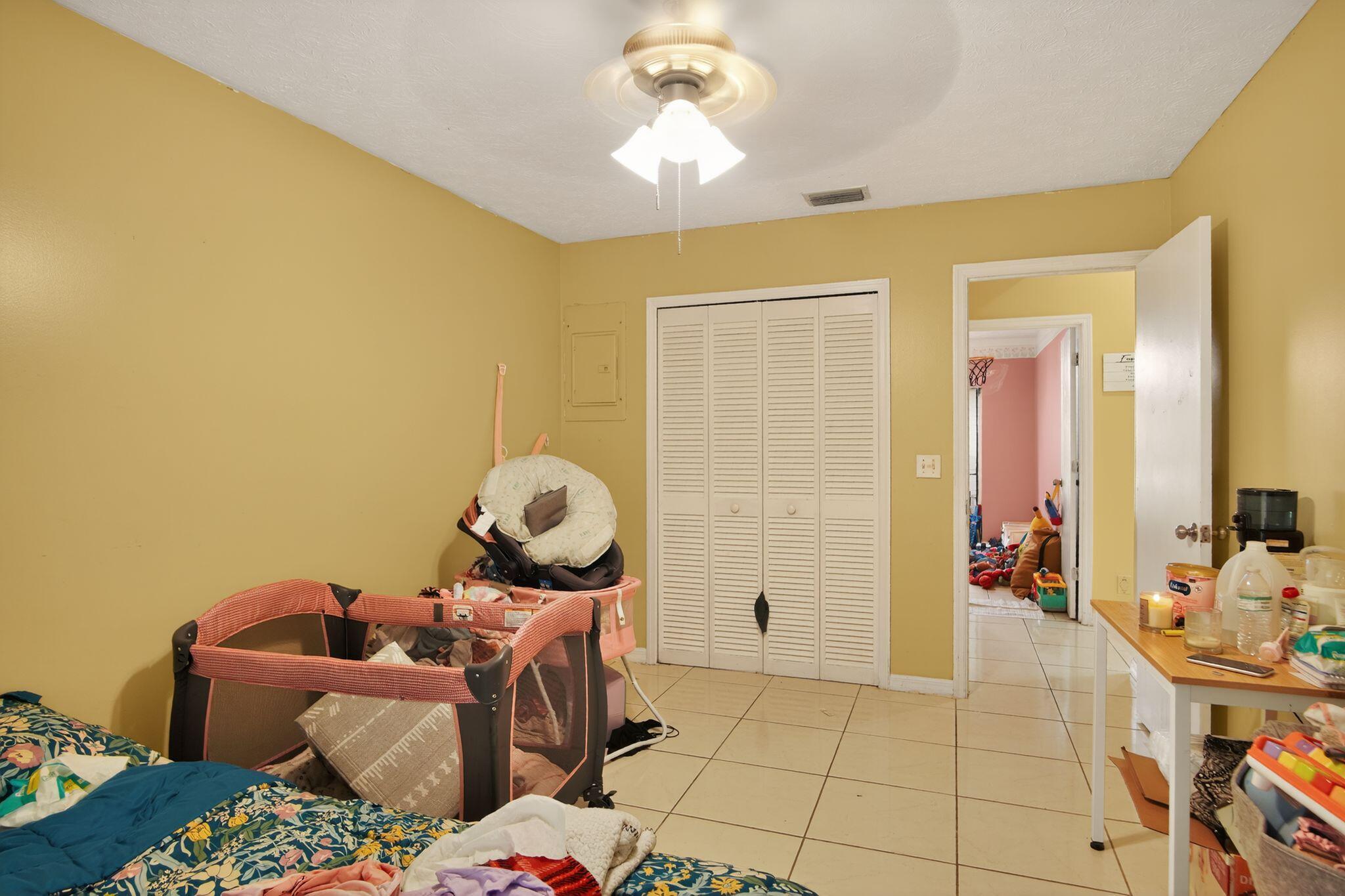 3053 Southeast Wake Road Port St. Lucie, FL 34984 - Photo 27 of 28 a living room with furniture