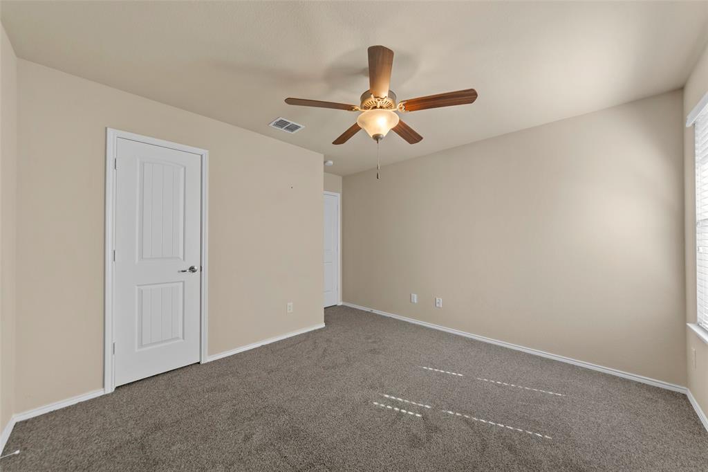716 Harrison Lane Lavon, TX 75166 - Photo 19 of 40 a view of a ceiling fan in a room