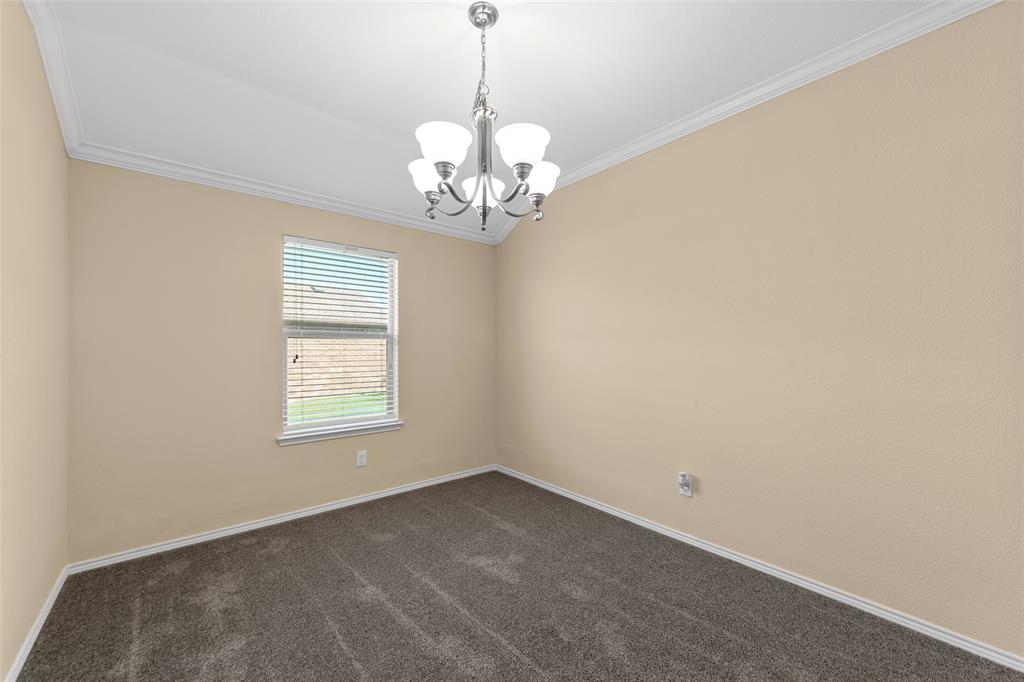 716 Harrison Lane Lavon, TX 75166 - Photo 27 of 40 a view of a chandelier in a room