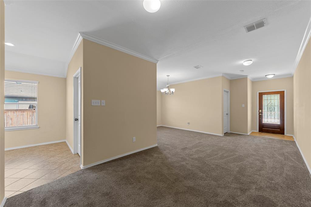 716 Harrison Lane Lavon, TX 75166 - Photo 28 of 40 an empty room with windows and closet